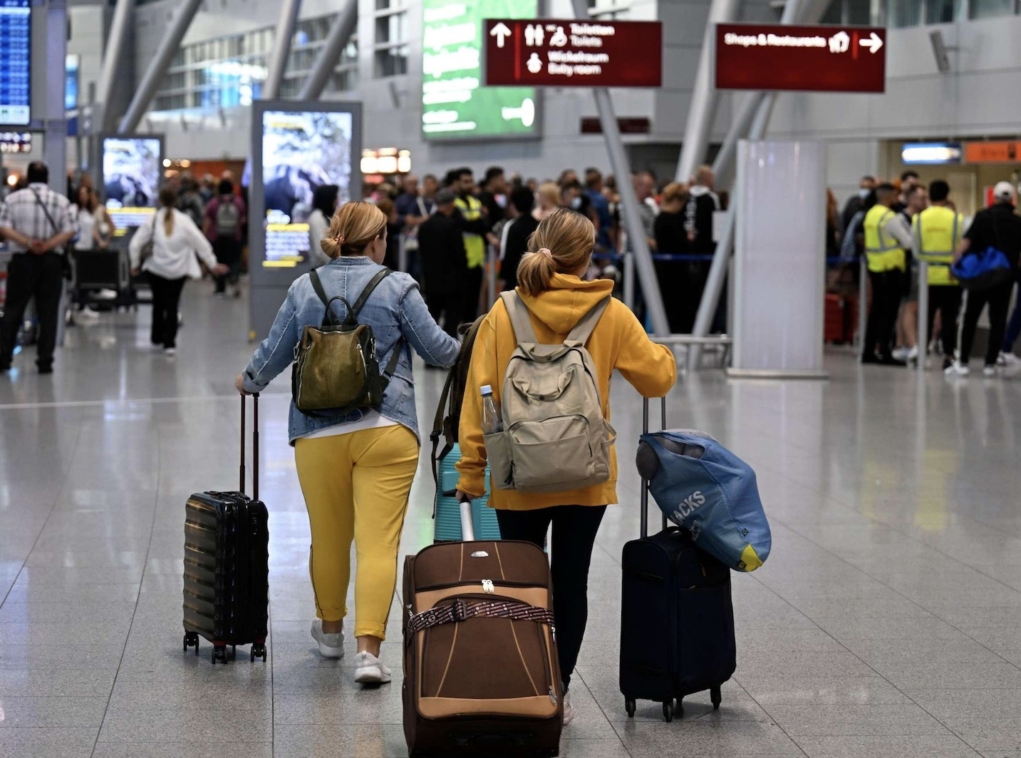 Passengers travelling through an international airport